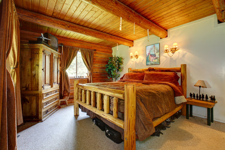 rustic bedroom with bed and wardrobe